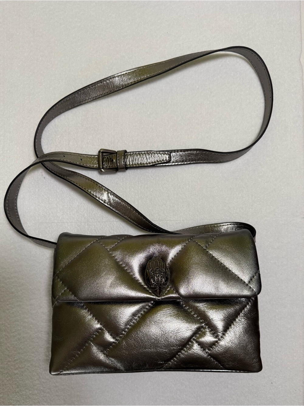 Kurt Geiger London Kensington cross body leather  bag features gunmetal-toned